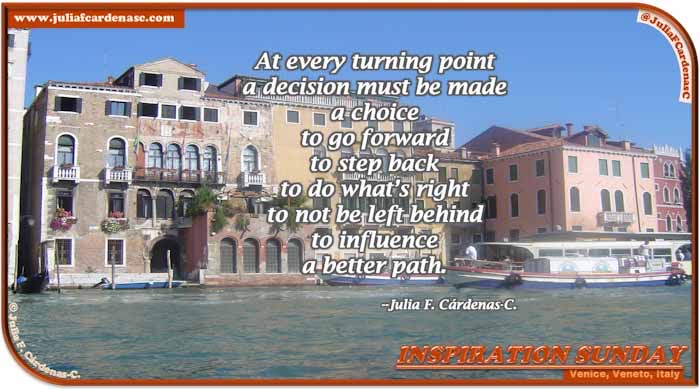 Poem-In-A-Photo. Poem about decision points in life. Photo from a Gondola of the beautiful Venice in Veneto, IItaly. Sunny day brightens the boat cruising over the bluish green Venetian waters, as well as the buildings that stand tall welcoming everyone. @JuliaFCardenasC